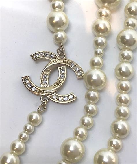 chanel pearl long strand necklaces.